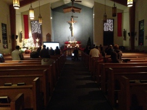 Students praying before the Blessed Sacrament